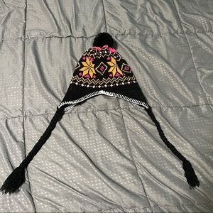 Winter gear hat black with bright pink orange accents snowflake Pom Pom